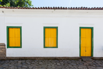 Street and old portuguese colonial houses in historic downtown in Paraty, state Rio de Janeiro