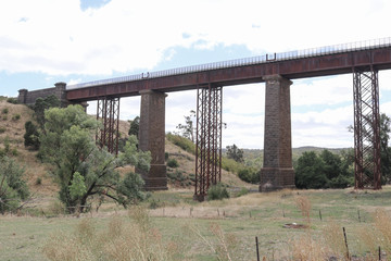 The Taradale railway viaduct, constructed of iron and bluestone, was opened in 1862