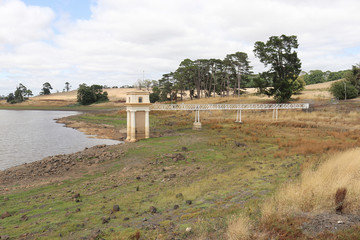 Intake tower and service bridge at Malmsbury Reservoir in Australia