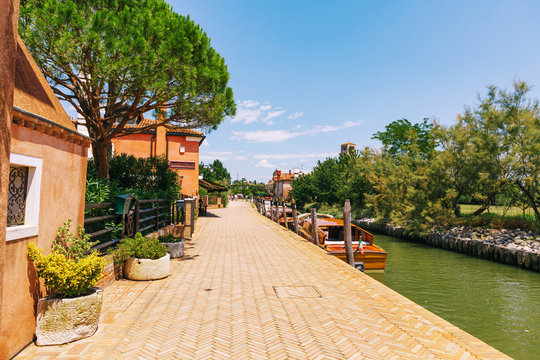 Fototapeta Tiny Torcello island has few residents but it's often busy with sightseers in summer near Venice, Italy