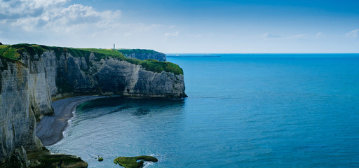 White Chalk Cliffs and Arches at Etretat in Normandy