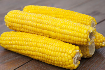 Close-up corn on wooden table
