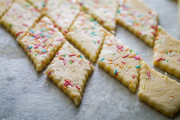 Closeup of homemade butter cookies with colored sprinkles