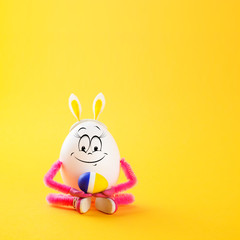 Egg girl wearing bunny ears with Easter egg