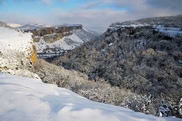 The Kachi-Kalion cave monastery view from the  Crimean Kyzyl-Burun mountain in winter