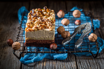 Yummy chocolate cake with walnuts and moouse