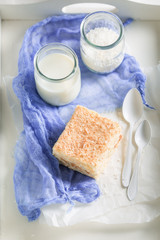 Enjoy your coconut cake with nuts and foam