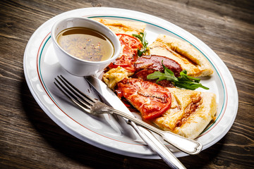 Pizza with salami and vegetables 