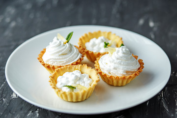 Delicate Cream Cakes. The concept of food, desserts, restaurant.