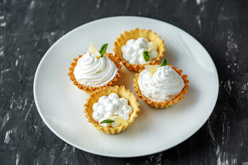 Assorted cakes with cream. The concept of food, desserts, restaurant.