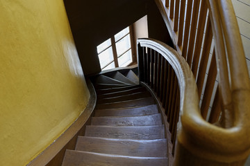 Old wooden round staircase spiraling © cdrw1973