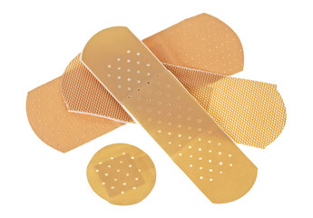 Medical adhesive plasters on a white background