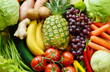 Colorful and various types of vegetables and fruits on sack background