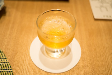 Plum wine in a small japanese wine glass