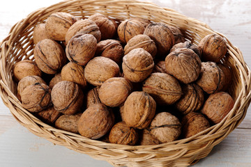 walnuts in small wicker basket