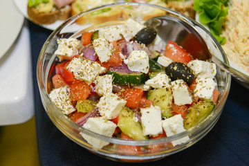 Greek salad on table
