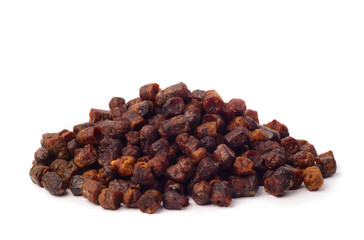 Pile of bee bread isolated on white background.Natural remedy for immunity enhancement. Beekeeping...