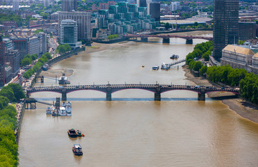 Lambeth Bridge across River Thames looking west past Lambeth, London, England