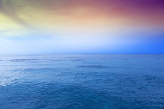 Amazing sunset over blue ocean