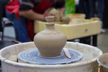 Clay pot in the potter's workshop. Craft