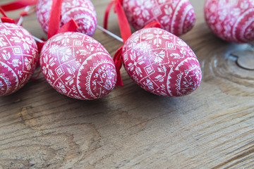 Easter eggs on wooden background close up