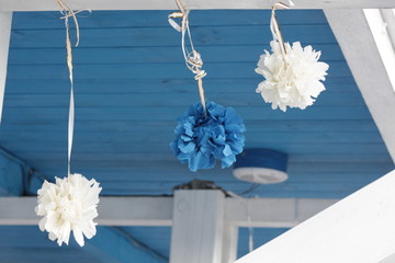 colorful paper flowers on a blue background