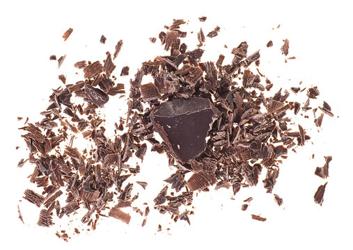 Pile of milled chocolate shavings on white background. Top view.
