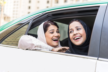 Two arabian girlfriends bonding and having fun