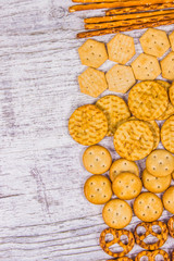 Mix of snacks : pretzels, crackers, cookies.
