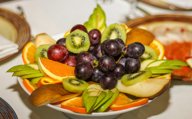 beautifully laid out fruit in plate closeup