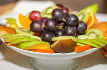 beautifully laid out fruit in plate closeup
