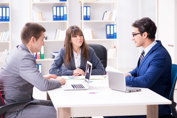 Business meeting with employees in the office