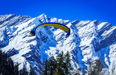 paragliding over Himalayas at Solang Valley near Manali India