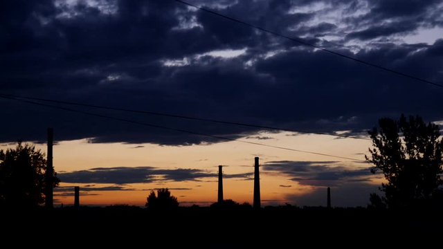 Electric power station at sunrise, time lapse