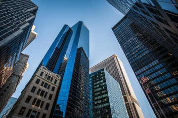 Fototapeta na wymiar High skyscrapers in Manhattan from below, New York City