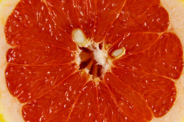 Texture of the grapefruit slice as background