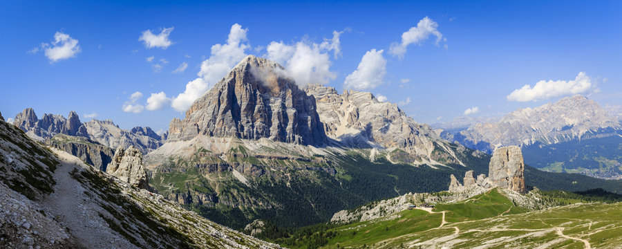 Great sunset view of the top Tofana di Rozes and Cinque Torri range in  Dolomites, South Tyrol. Location Cortina d'Ampezzo, Italy, Europe. Dramatical cloudy scene. Beauty of mountains world.