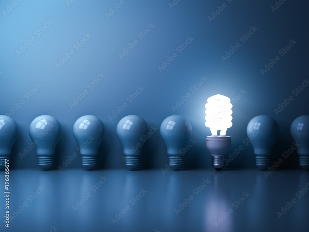 Aufkleber eco energy saving light bulb , one glowing compact fluorescent lightbulb standing out from unlit inc