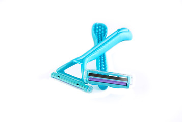 Blue female razors isolated on the white background. Razor for female shaving.