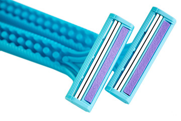 Blue female razors isolated on the white background. Razor for female shaving.