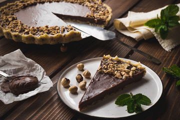 Nutella, hazelnut tart. Chocolate dessert.