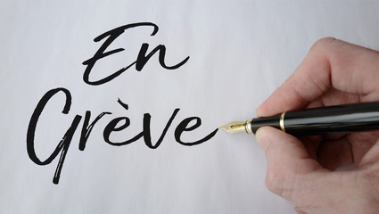 en grève stylo plume