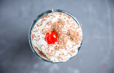 Chocolate milkshake on the rustic background. Selective focus.