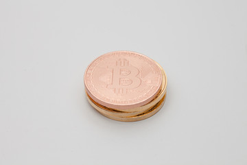  Pile up of crypto currency on gray background 