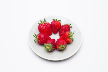 Strawberries arranged on plate