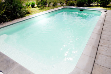Swimming pool in summer garden