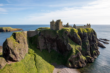 Fototapeta premium Dunnottar Castle is a ruined medieval fortress located upon a rocky headland on the north-east coast of Scotland