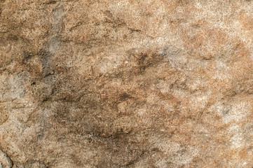 Ancient rough sandstone surface closeup as natural background