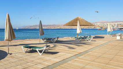 Morning at central public beach of Eilat - number one resort and recreational city in Israel located on the Red Sea
