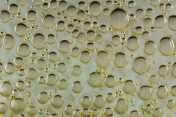 Close up of air bubbles inside glass surface. Useful for design element.